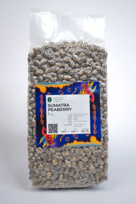 A collection of Sumatra Peaberry coffee beans, featuring their characteristic roundness and glossy surface, ideal for a bold brew.