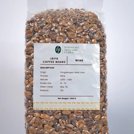 A steaming cup of coffee with a rich, dark color, surrounded by coffee beans and a wine glass in the background.