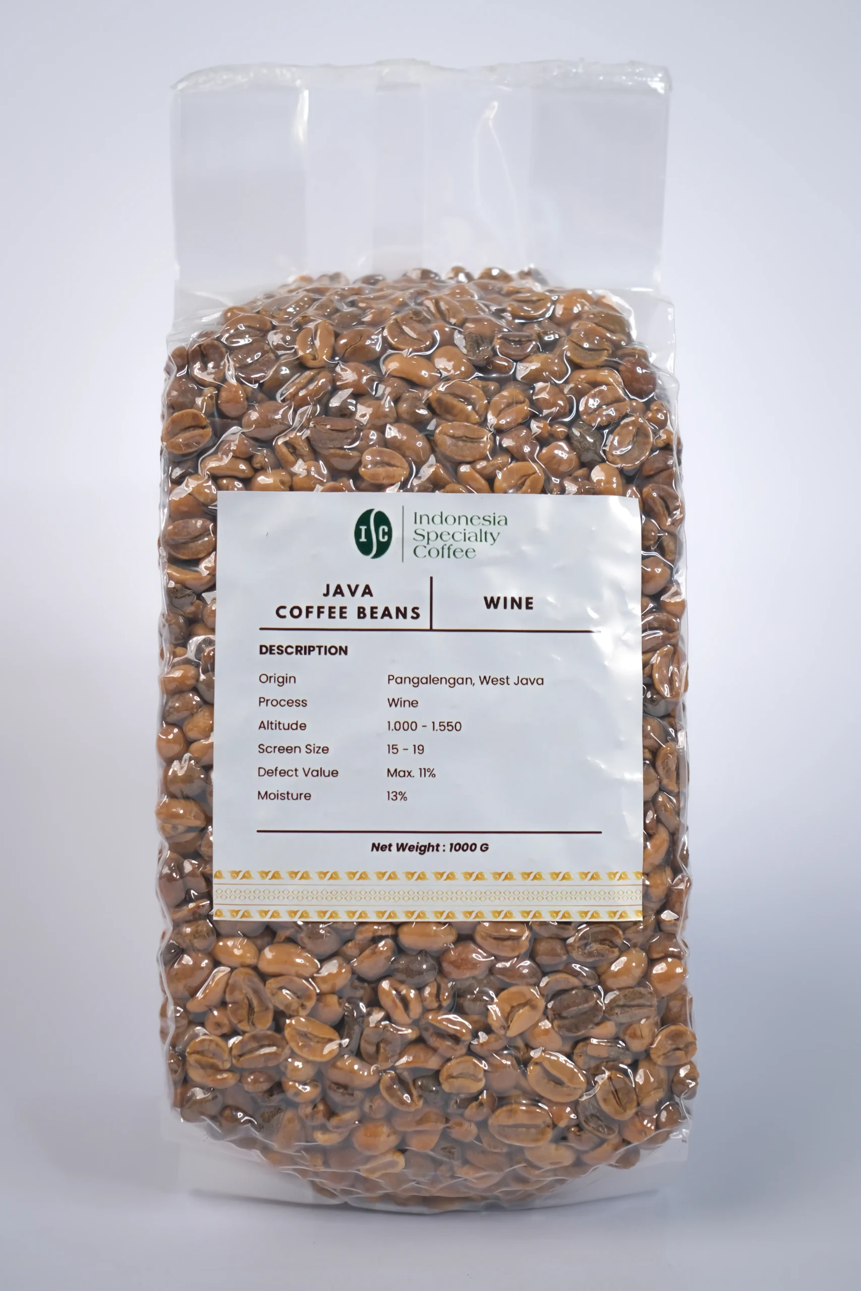 A steaming cup of coffee with a rich, dark color, surrounded by coffee beans and a wine glass in the background.