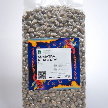 A collection of Sumatra Peaberry coffee beans, featuring their characteristic roundness and glossy surface, ideal for a bold brew.